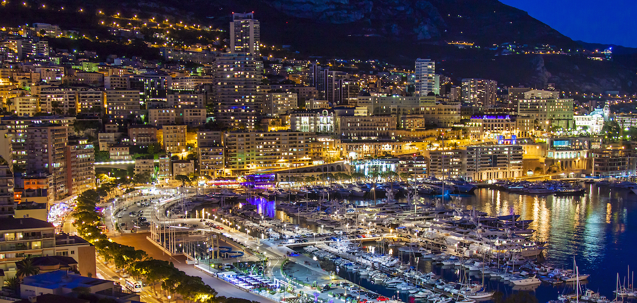 Monaco. Night view of the houses and the bay .